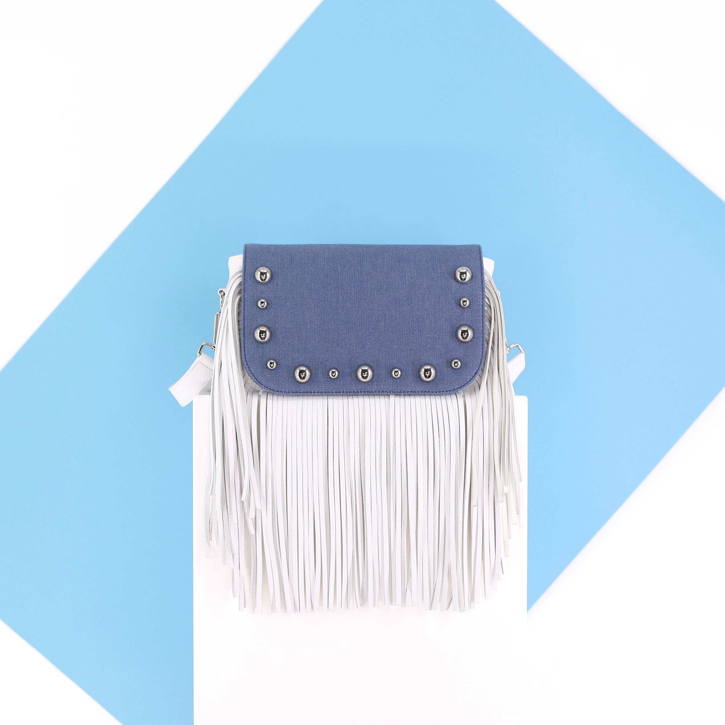 BRONX flap in a light blue jeans fabric with studs small