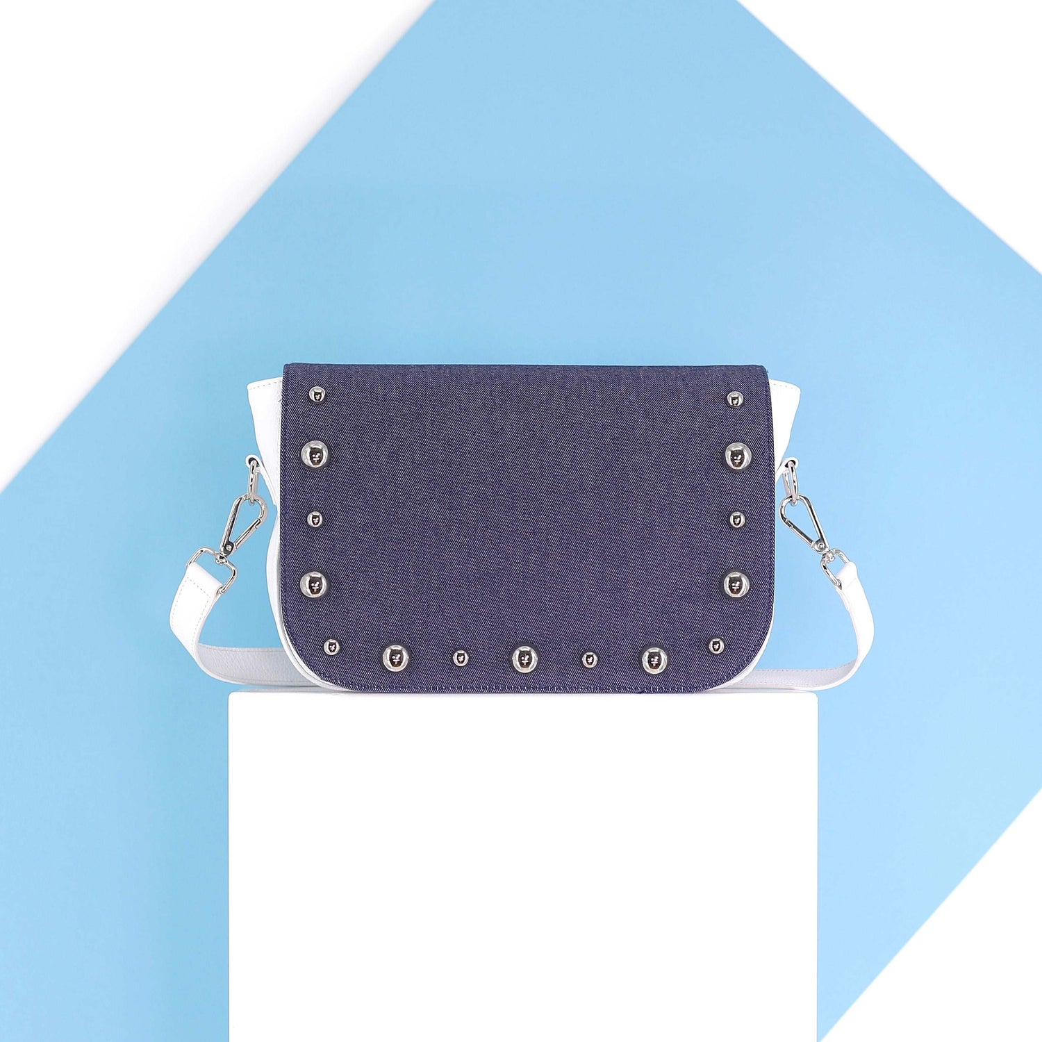 BRONX flap in a dark blue jeans fabric with studs medium