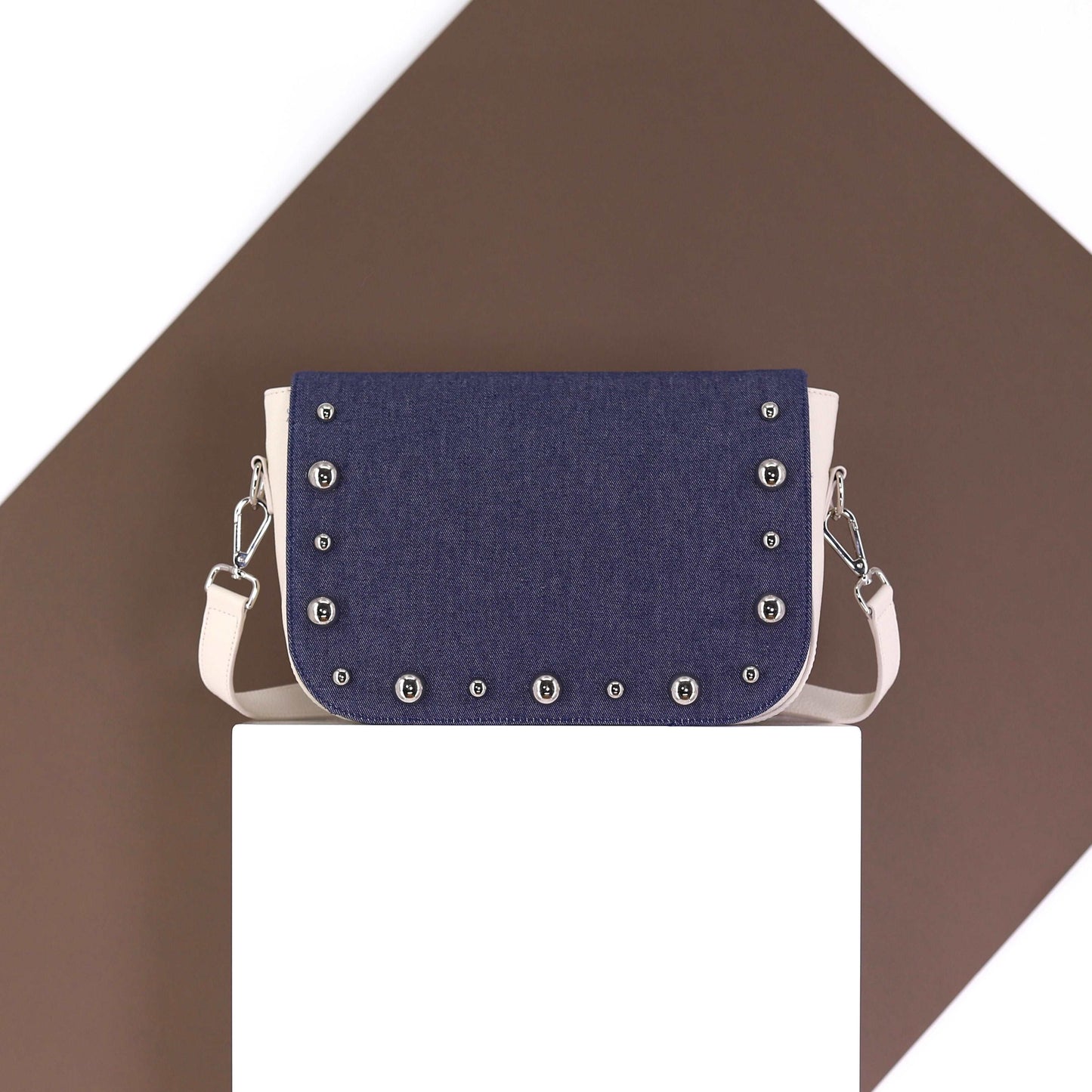 BRONX flap in a dark blue jeans fabric with studs medium