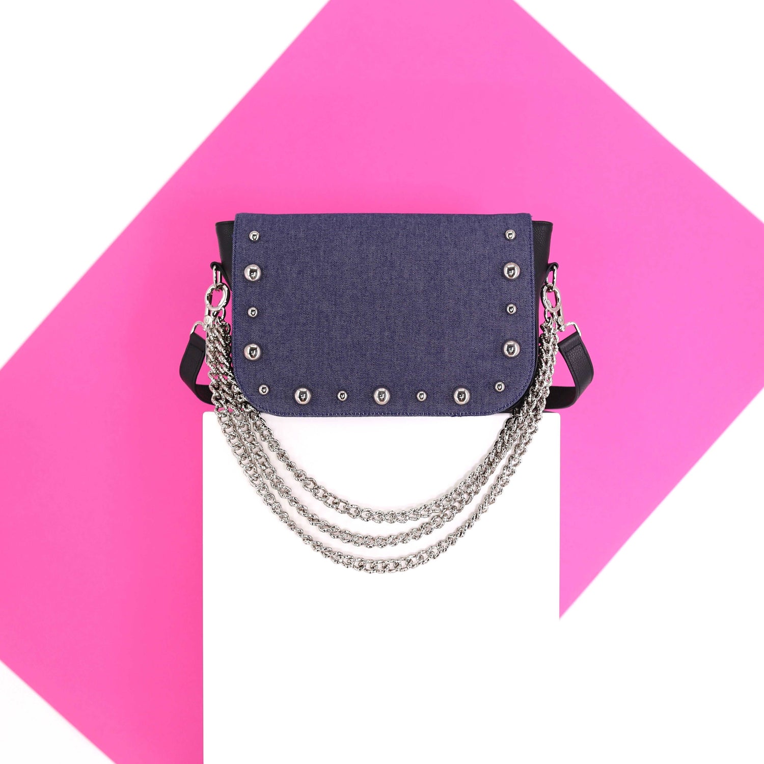 BRONX flap in a dark blue jeans fabric with studs medium