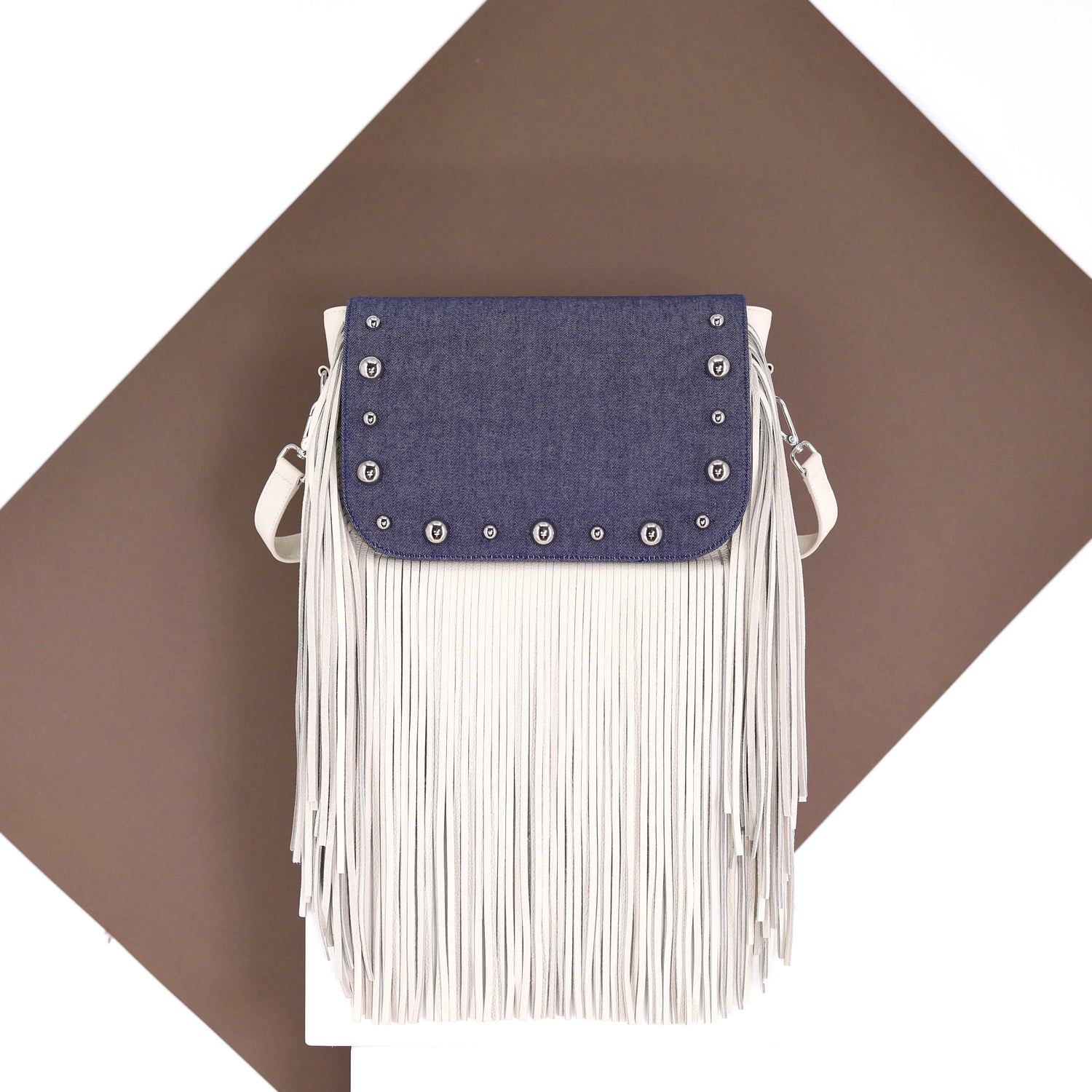 BRONX flap in a dark blue jeans fabric with studs medium