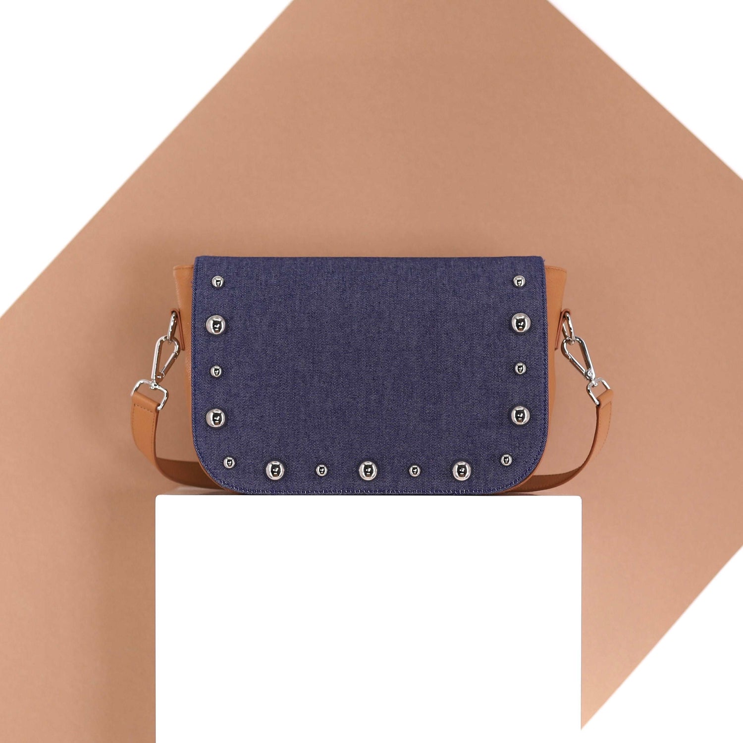 BRONX flap in a dark blue jeans fabric with studs medium