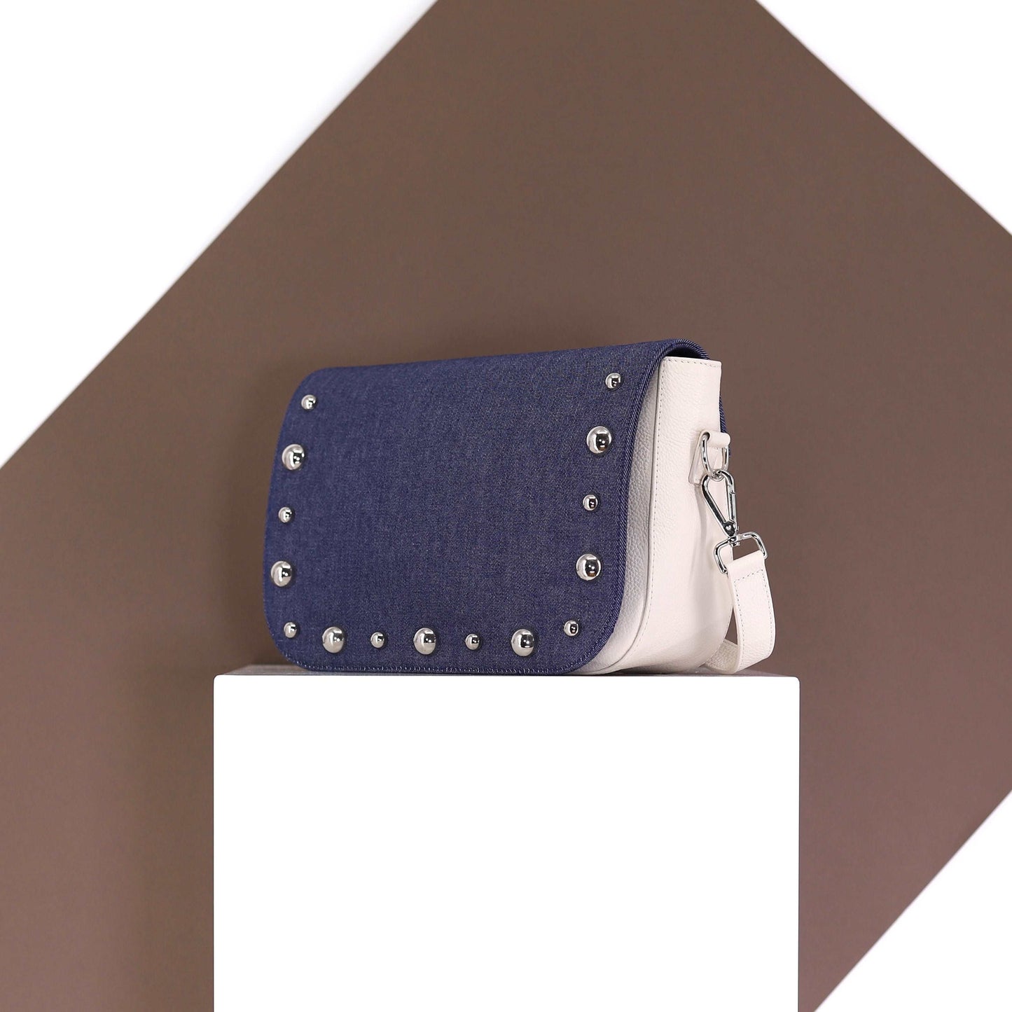 BRONX flap in a dark blue jeans fabric with studs medium